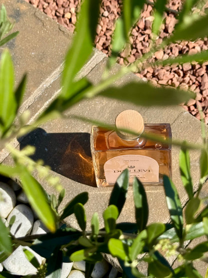 Don Levi Rosa Tequila - A peachy pink tequila aged in port barrels behind some olive branches